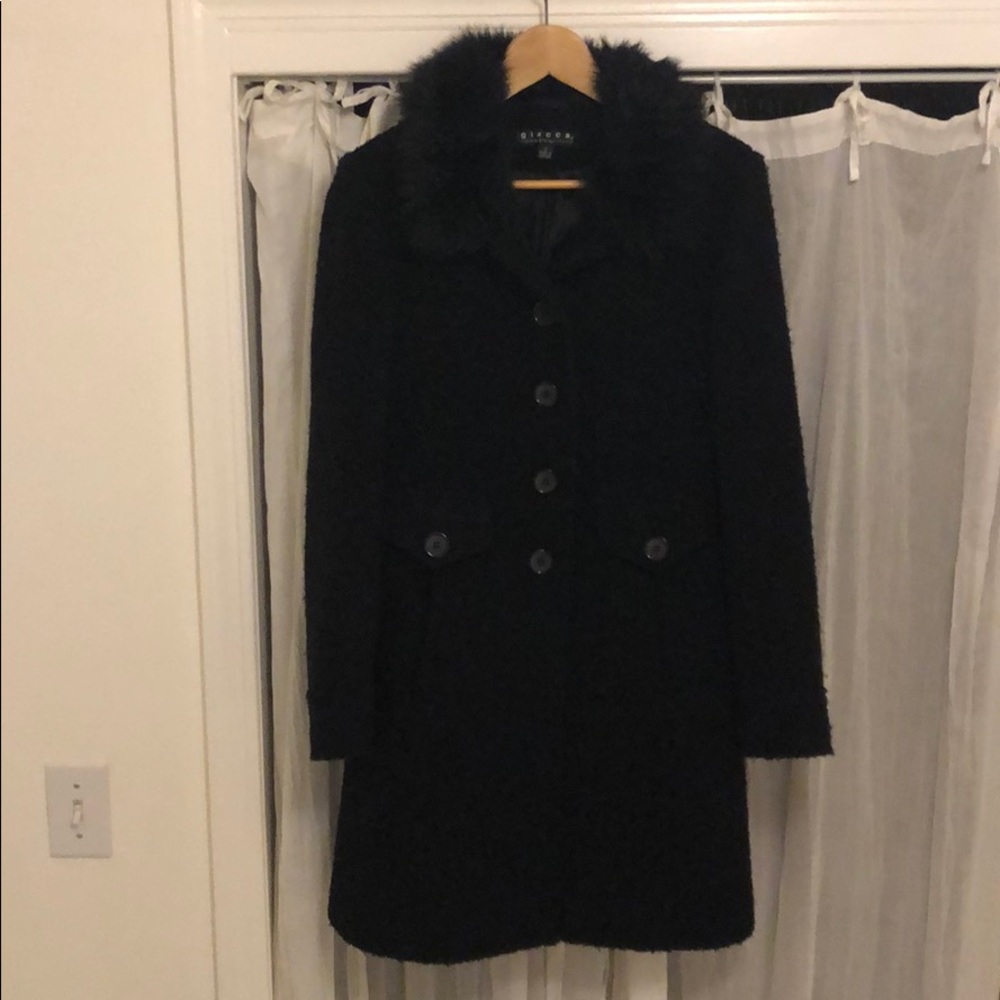 Wonderful, long winter coat with faux fur collar.